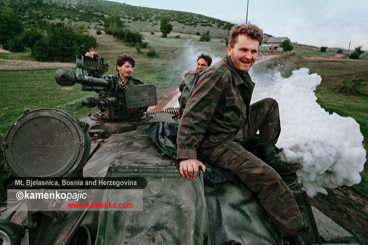 Bosnian Serb soldiers riding a tank near Mt. Bjelasnica