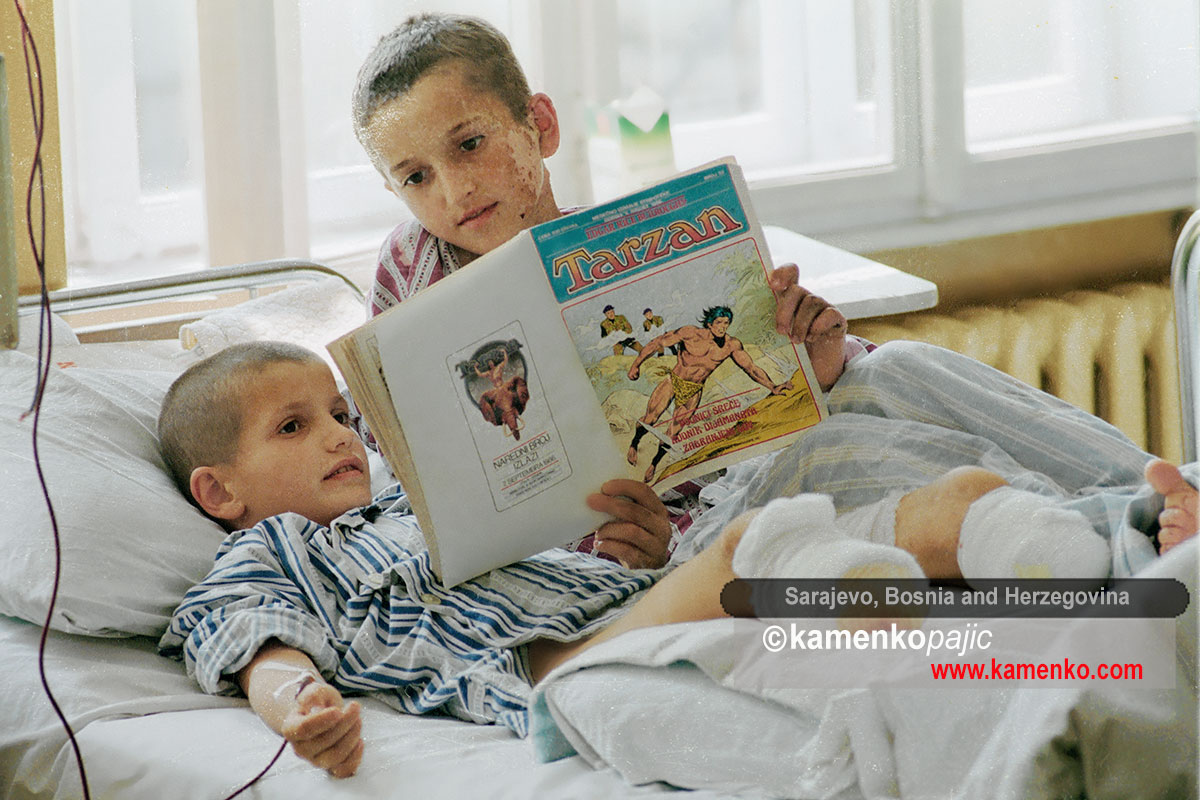 The children read Tarzan comics at a hospital