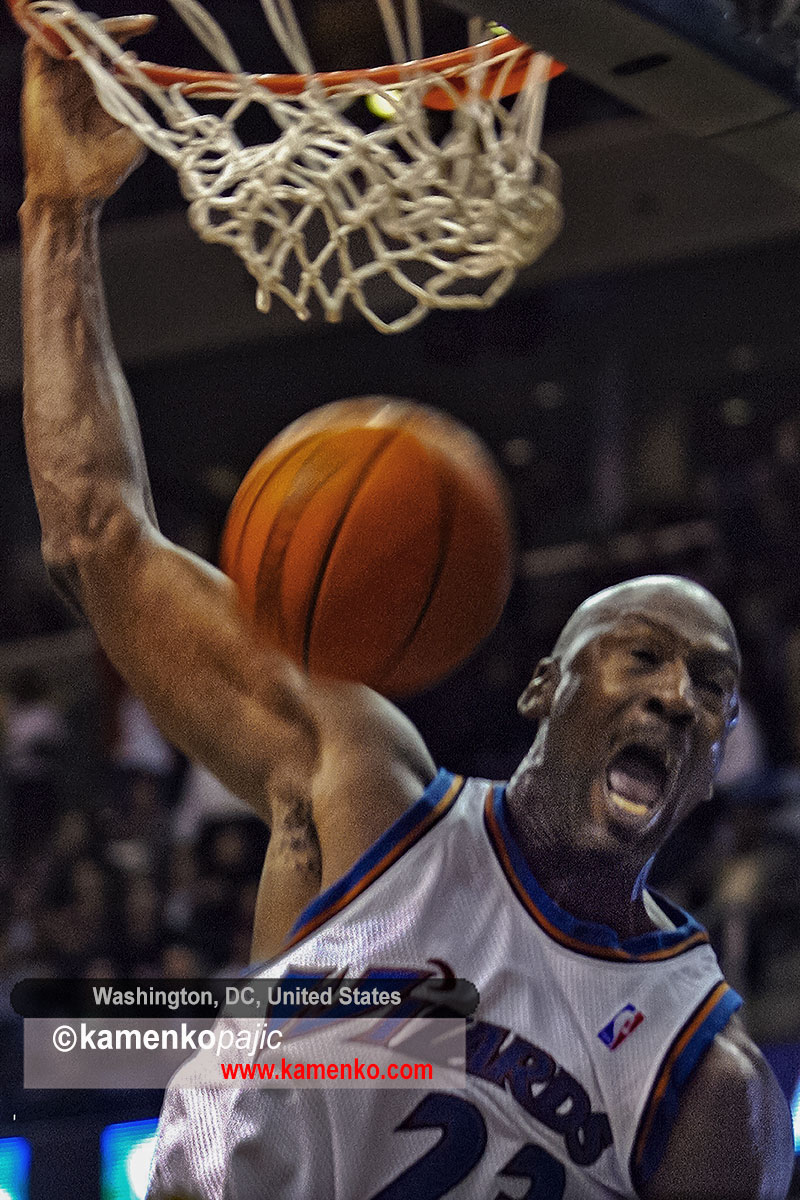 Washington Wizards guard Michael Jordan dunks during the fourth quarter against the Seattle SuperSonics in Washington, Tuesday, November. 12, 2002