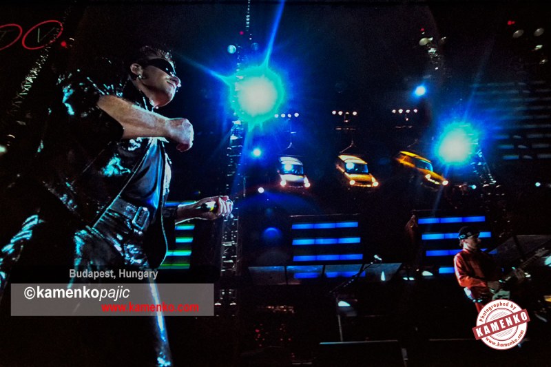Bono (Paul Hewson), left, and The Edge (David Evans) perform during U2's Zooropa tour at the Népstadion concert on July 23, 1993 in Budapest, Hungary